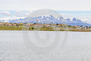 Beagle channel, mountains and buildings in Ushuaia