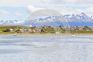 Beagle channel, mountains and buildings in Ushuaia