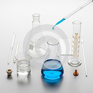 A beaker, Erlenmeyer flask, and graduated cylinder. The beaker