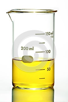 Beaker With Yellow Liquid On White