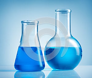 Beakers and blue liquid