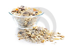 Beakfast cereals in bowl. Healthy muesli with oat flakes, nuts and raisins