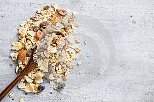 Beakfast cereals . Healthy muesli with oat flakes, nuts and raisins