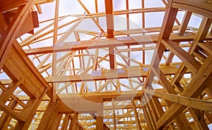 Beam close-up building with under construction wooden house with timber framing