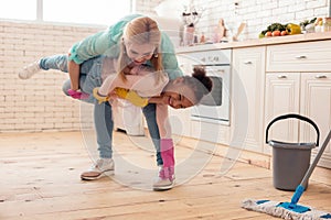 Beaming foster child laughing spending time with mom