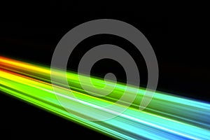 Beams of light refracting and creating a rainbow spectrum