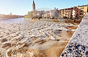 Beams morning sun bridge Ponto Pietra river Adige Italy Verona