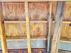 Beams and rafters add support to porch construction 