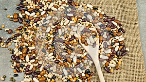 Beans of bean. Background of many grains of dried beans. Brown beans texture. Food background