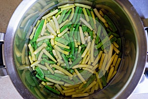 The beans are cooked in a saucepan