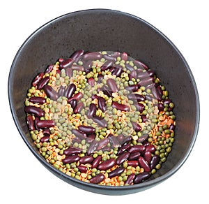 Beans mixture in ceramic bowl isolated on white