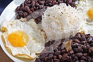 Beans with rice and egg. Typical food from the Caribbean, many parts of Latin America and Sephardic communities