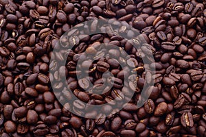 Beans of roasted coffee - food background