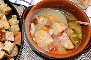 Beans soup with crostine roasted bread italian food