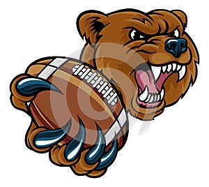 Bear American Holding Football Ball