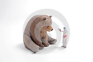 a Bear with Bandage and Clinical Thermometer