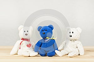 Bear cubs. Three multi-colored teddy bears. Stuffed Toys