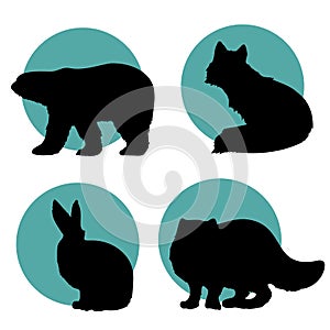 Bear, fox, hare, polar fox silhouettes on the green circle shapes. North animals. Icons.