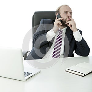 Beard business man on desk with cell phone