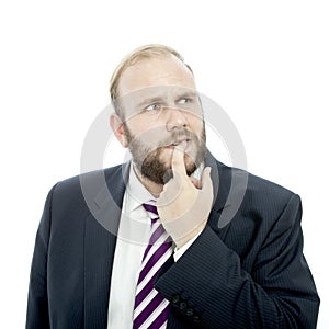 Beard business man is thinking and unsure