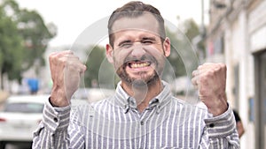 Beard Casual Man Celebrating Success Outdoor