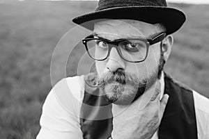 Beard man in field lonley