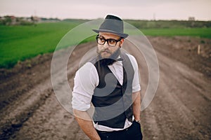 Beard man in field lonley