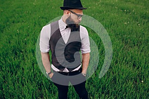 Beard man in field lonley