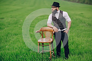 Beard man in field lonley