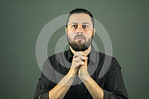 Beard man praying. Religious life