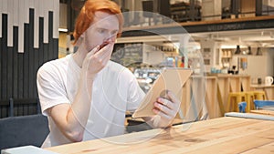 Beard Man In Shock, Reading Email on Tablet PC in Cafe