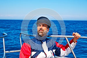 Beard sailor cap man sailing sea ocean in a boat
