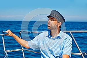 Beard sailor cap man sailing sea ocean in a boat