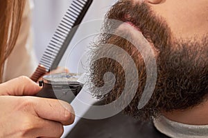 Beard trimming close up.