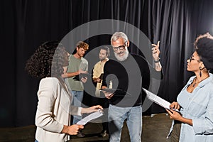 bearded art director pointing with finger photo