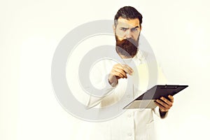 Bearded brutal caucasian doctor or postgraduate student