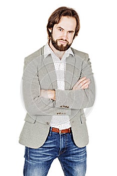 bearded business man with suspicious emotion. human emotion expression and lifestyle concept. image on a white studio background.