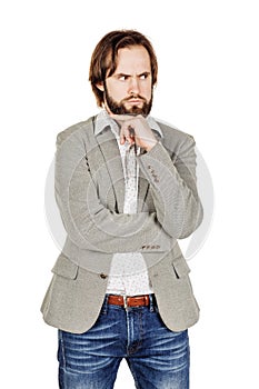 bearded business man with suspicious emotion. human emotion expression and lifestyle concept. image on a white studio background.