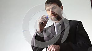 Bearded businessman draws the schedule, circuit block and diagram