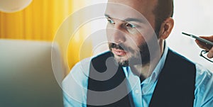 Bearded businessman working at home workplace. worker in social  distance isolation. Finance consultant man thinking looking