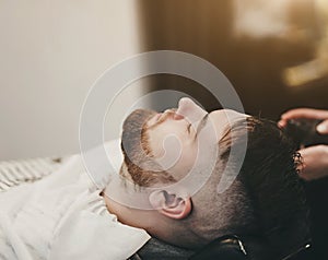 Bearded client in a barbershop