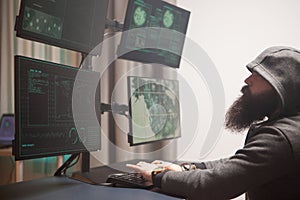 Bearded cyberterrorist wearing a hoodie