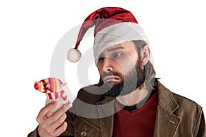 Bearded depressive Santa Claus man