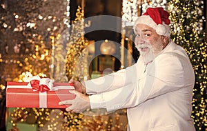 Bearded grandfather man celebrate christmas. Christmas gift. Happy Santa Claus. Joyful present well remembered past