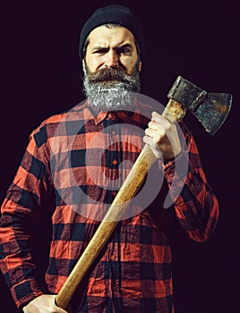 Bearded handome man with axe