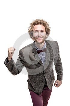 Bearded happy smiling businessman rejoicing for his success