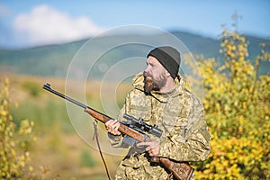 Bearded hunter spend leisure hunting. Focus and concentration of experienced hunter. Hunting and trapping seasons