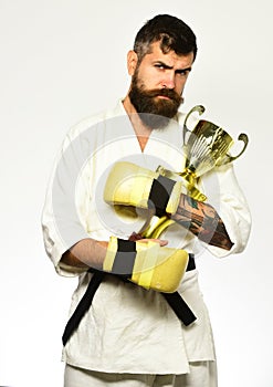 Bearded karate man or brutal caucasian hipster with moustache