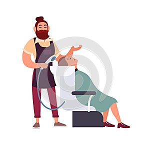 Bearded male hipster hairdresser or stylist washing with shampoo hair of his cheerful female client sitting in chair