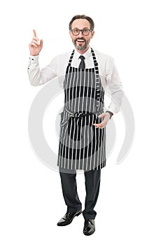Bearded man in apron salesman. Master of household. Home cooking. Household duties. Helpful husband concept. Share
